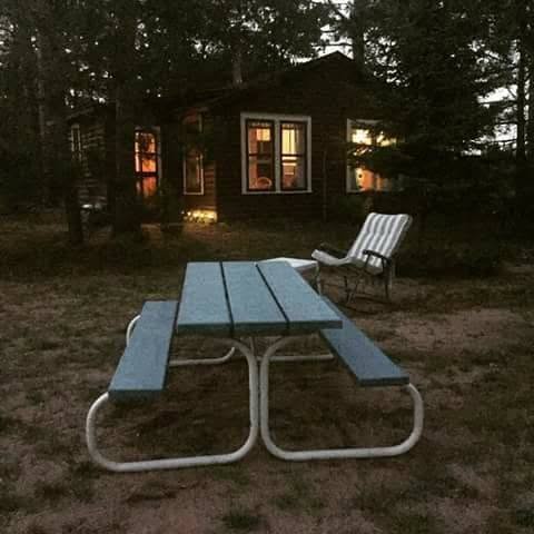 a cozy cabin at dusk